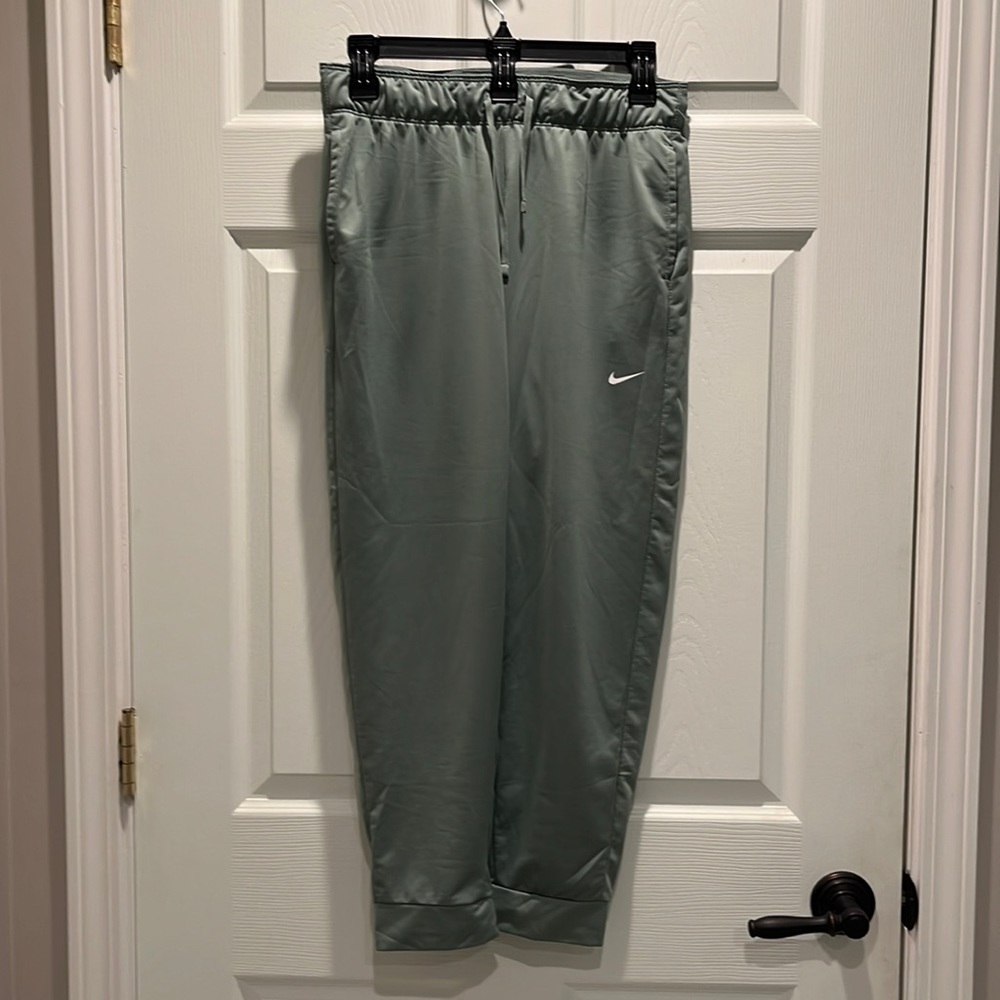 Green Nike joggers.